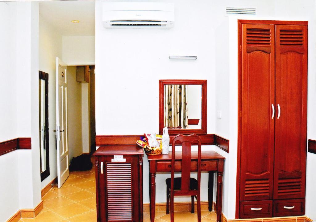 Hoang Thanh Thuy Airport Hotel 1 - Gan Am Thuc Dem Cho Hoang Hoa Tham Ho Či Minovo Město Pokoj fotografie