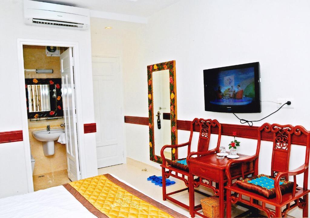 Hoang Thanh Thuy Airport Hotel 1 - Gan Am Thuc Dem Cho Hoang Hoa Tham Ho Či Minovo Město Pokoj fotografie